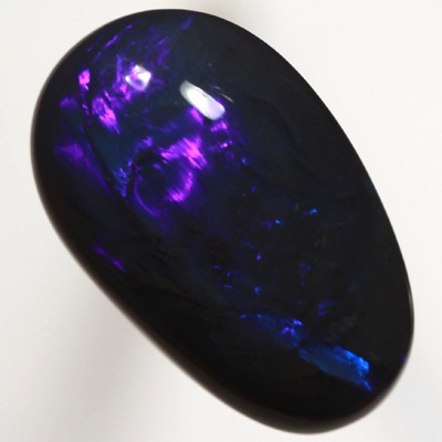 SOLID BLACK OPAL Bright electric blue roling flashes SEE VIDEOS